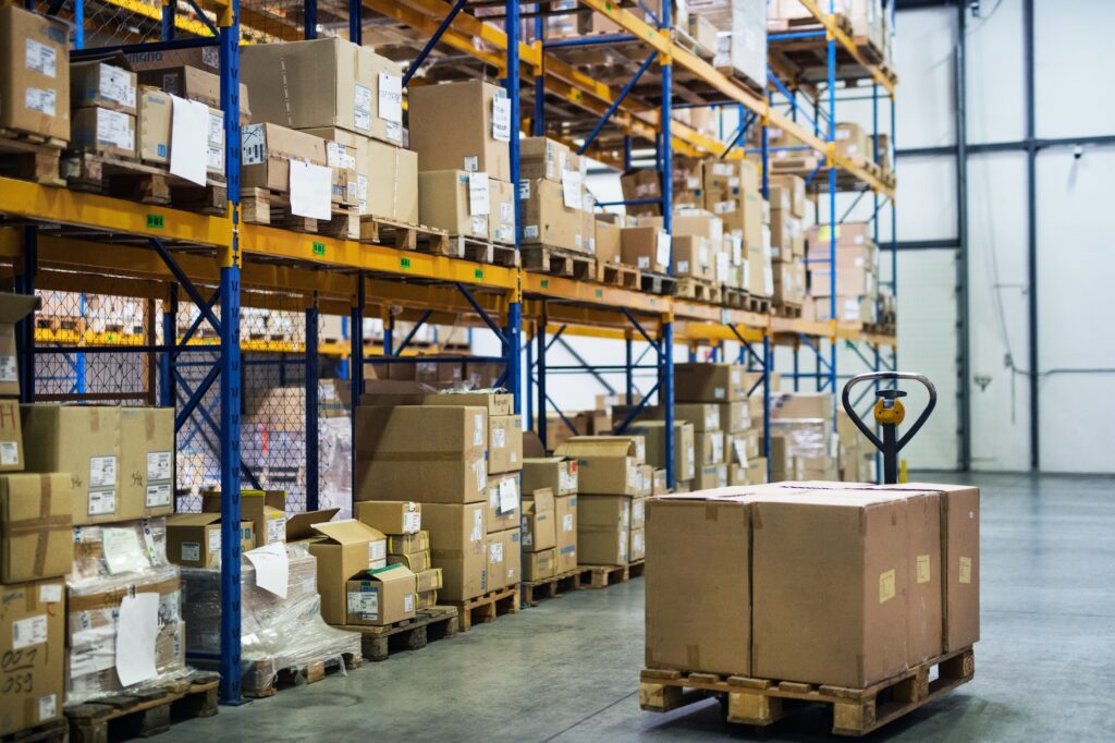 An interior of a warehouse with pallet truck.